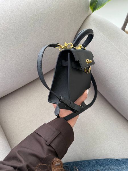 Herm&egrave;s Mini Kelly Black Gold Hardware Магнітна коробка H8212 фото